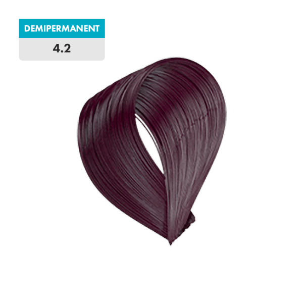 A swatch of 4.2 - Medium Violet Brown (Demipermanent) hair dye, a rich medium violet brown shade, is displayed against a green background.