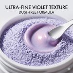 An open container of Blond Plex Violet Lightener Powder is stirred with a metallic spatula, revealing its ultra-fine, shimmery, dust-free violet texture. Text reads: "Ultra-Fine Violet Texture, Dust-Free Formula.