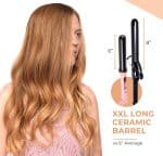 A woman with long, wavy hair is shown next to the XXL barrel of the Ultimate Pro Clip Curling Iron 1", compared to a standard 6-inch curling iron barrel.