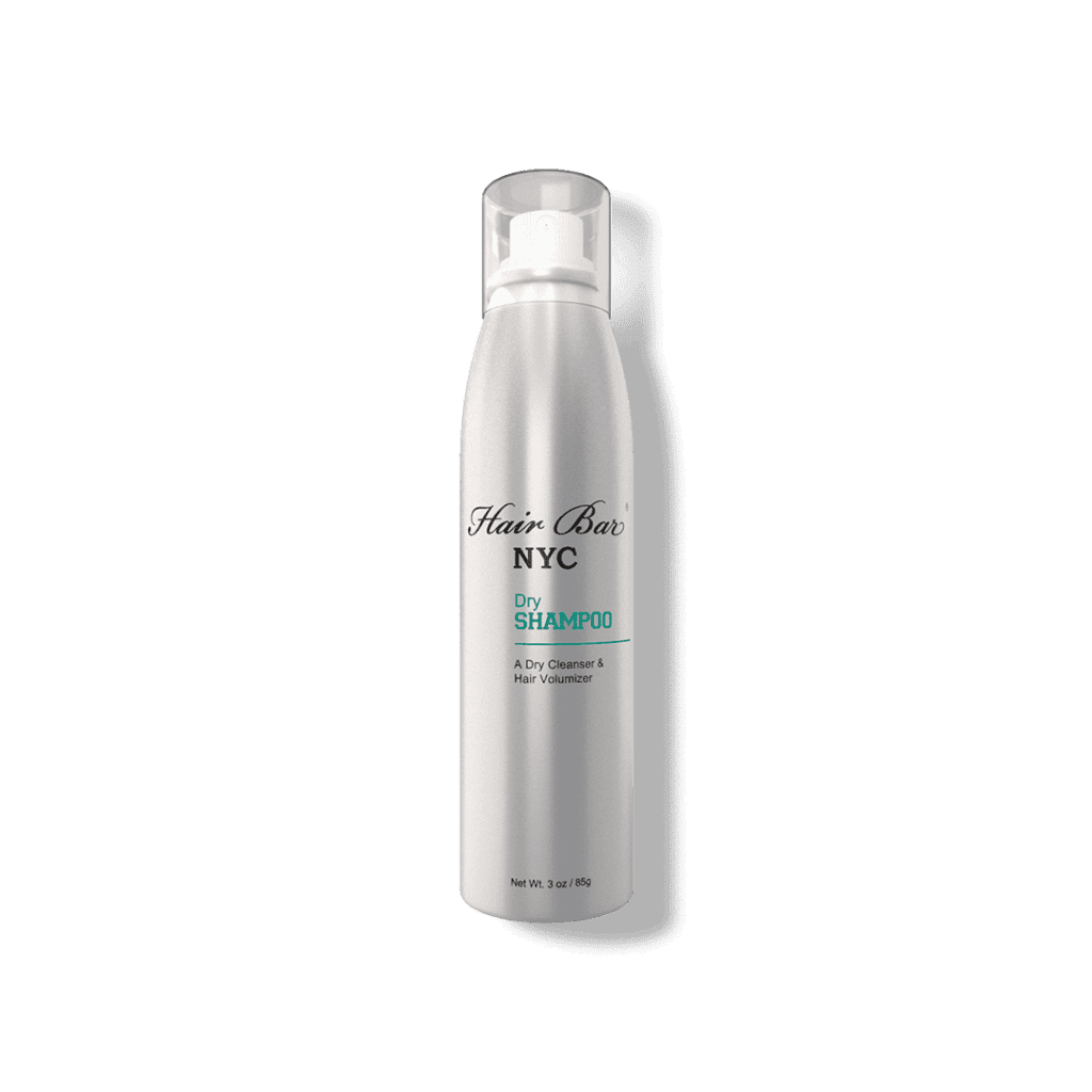 A silver aerosol can of Hair Bar NYC Dry Shampoo with a clear plastic cap stands upright on a plain background.