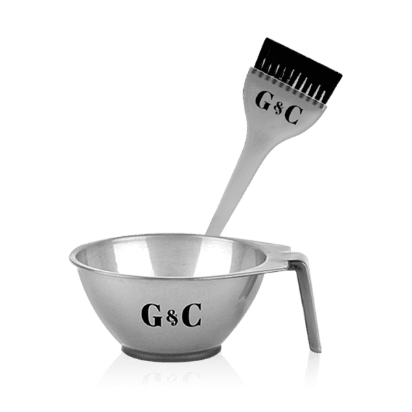 The G&C Bowl & Brush set features a metal mixing bowl with a handle and a matching brush, both labeled "G&C," displayed upright against a plain background.