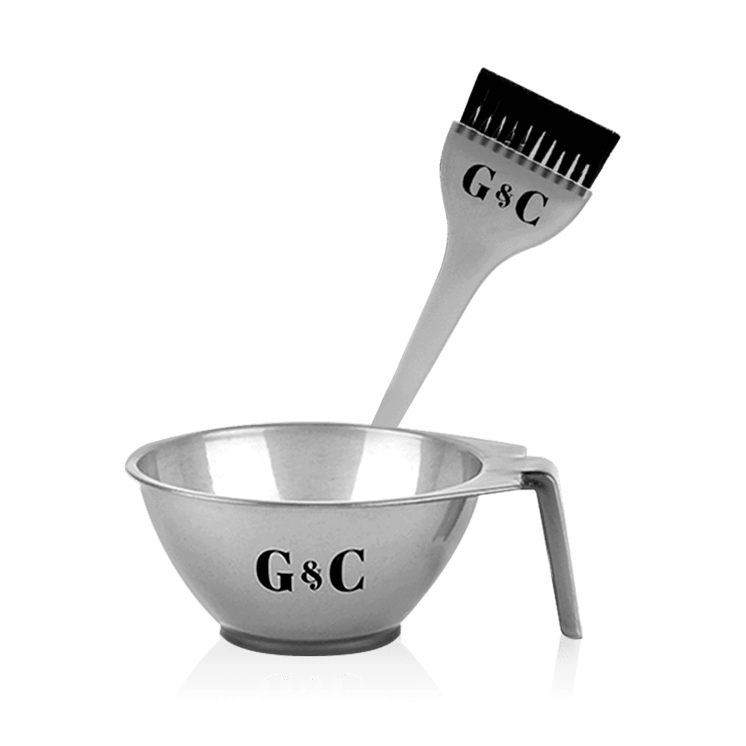 The G&C Bowl & Brush set features a metal mixing bowl with a handle and a matching brush, both labeled "G&C," displayed upright against a plain background.