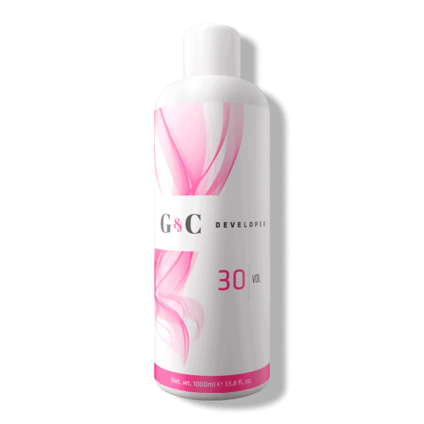 A 1000 ml (33.8 fl oz) white bottle labeled "G&C Cream Developer 30 Volume" with pink abstract designs.