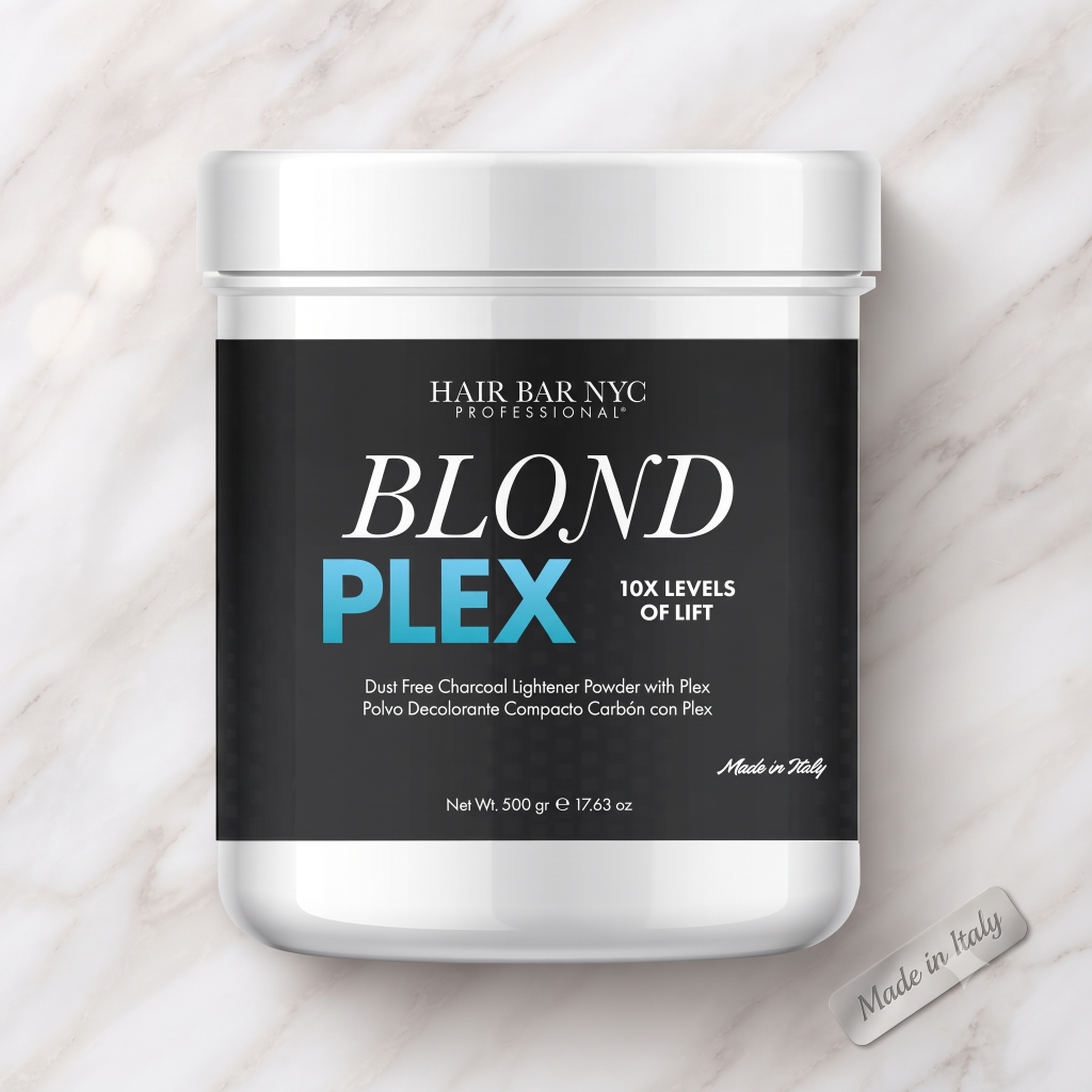 A 500g container of Blond Plex Charcoal Lightener Powder, labeled for 10X levels of lift, sits on a marble surface.