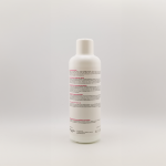 A white plastic bottle with a white cap, shown from the back, displays several lines of information and instructions in black and red text for G&C Cream Developer 40 Volume.