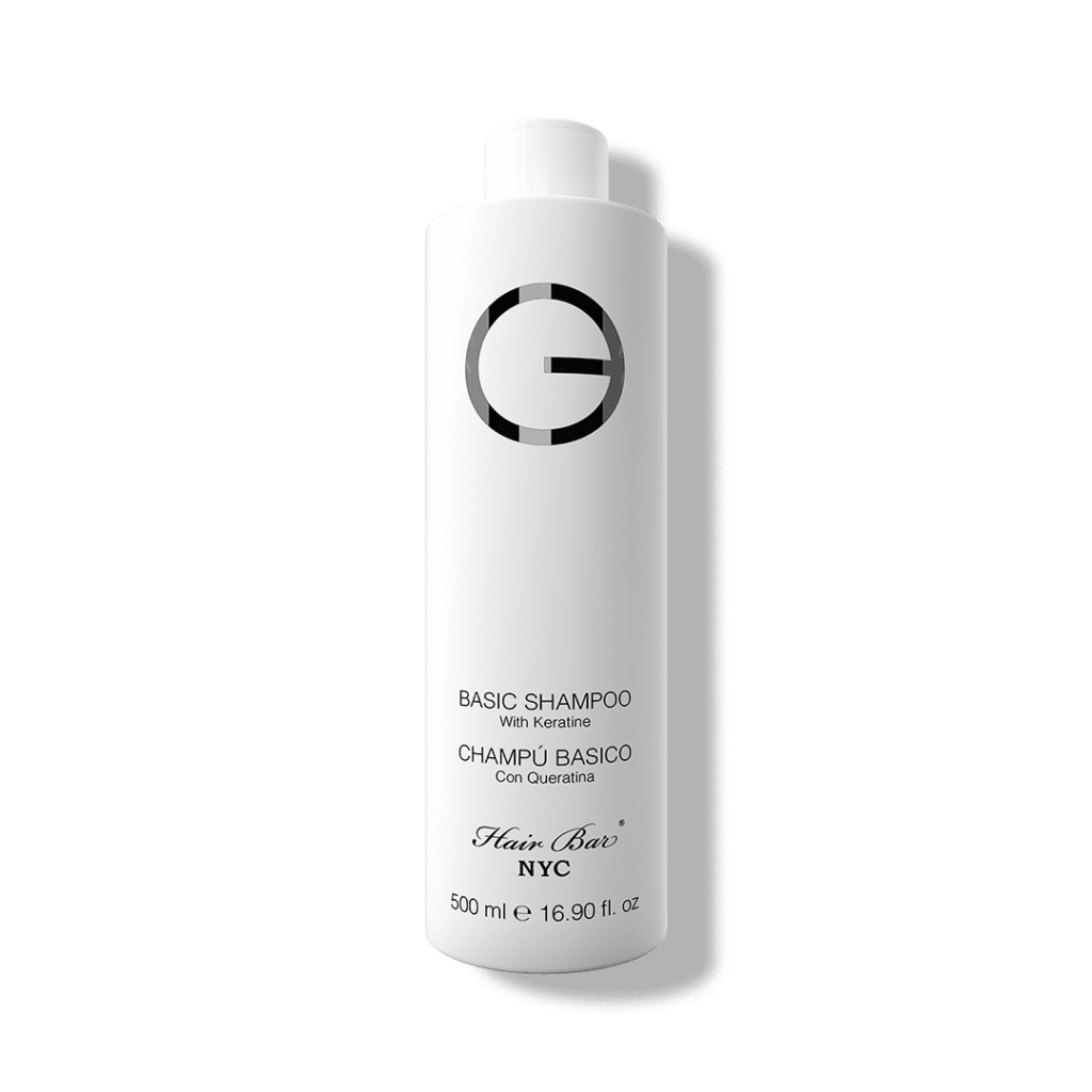 A white bottle labeled "Clarifying Shampoo 16.9 oz" by Hair Bar NYC features sleek black text and a circular logo on the upper front, highlighting it as an essential daily hair care shampoo.