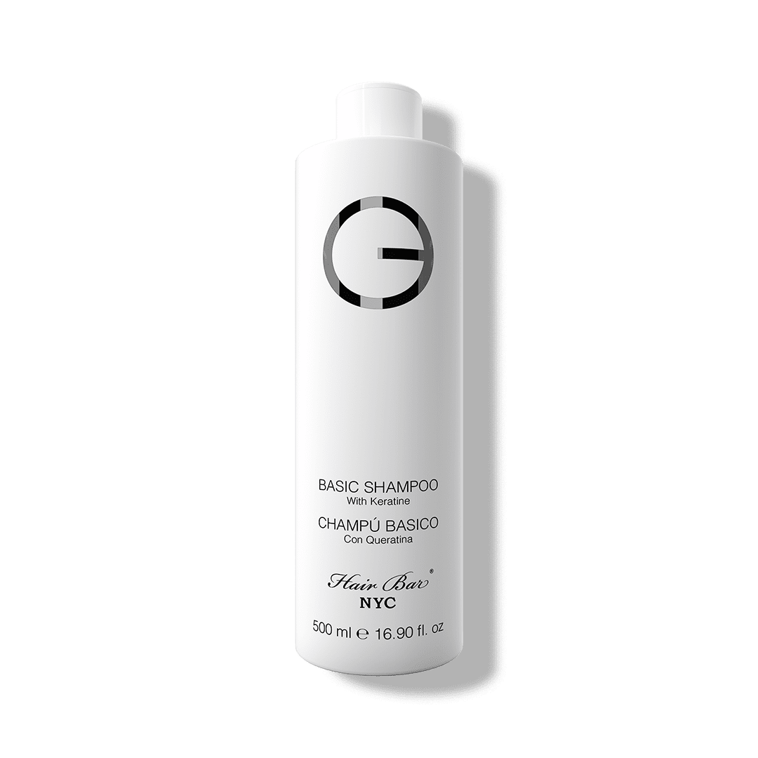 A white bottle labeled "Clarifying Shampoo 16.9 oz" by Hair Bar NYC features sleek black text and a circular logo on the upper front, highlighting it as an essential daily hair care shampoo.