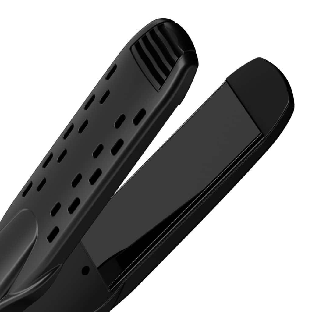 Close-up of the Silk Touch Professional Ionic Flat Iron with ceramic plates, open and ready for use—ideal for achieving sleek, smooth hair after a diamond botox treatment.