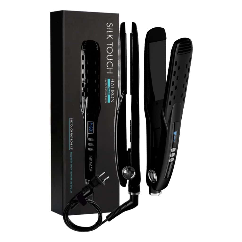The Silk Touch Professional Ionic Flat Iron, a black hair straightener with digital display, control buttons, and power cord, is shown next to its packaging—ideal for sleek styles or use with diamond botox treatments for added shine.