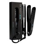 The Silk Touch Professional Ionic Flat Iron, a black hair straightener with digital display, control buttons, and power cord, is shown next to its packaging—ideal for sleek styles or use with diamond botox treatments for added shine.
