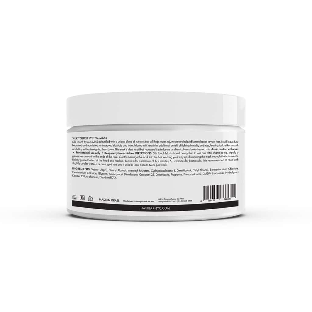 White plastic jar with a white lid displaying the back label, which provides the product description, directions, ingredients, and manufacturer information for Silk Touch System Conditioner.