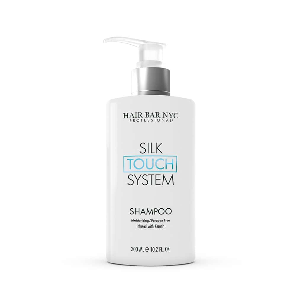 Silk Touch System Conditioner, in a white 300 ml bottle with a pump, is moisturizing, paraben free, keratin-infused, and pairs perfectly with the Silk Touch System Shampoo.