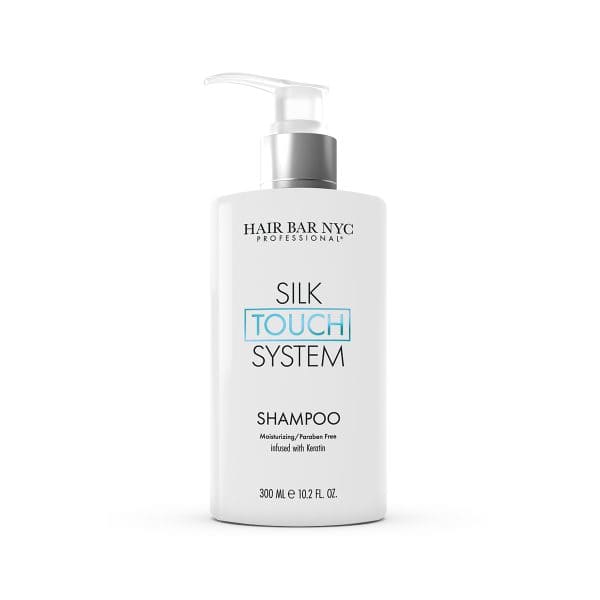 Silk Touch System Conditioner, in a white 300 ml bottle with a pump, is moisturizing, paraben free, keratin-infused, and pairs perfectly with the Silk Touch System Shampoo.
