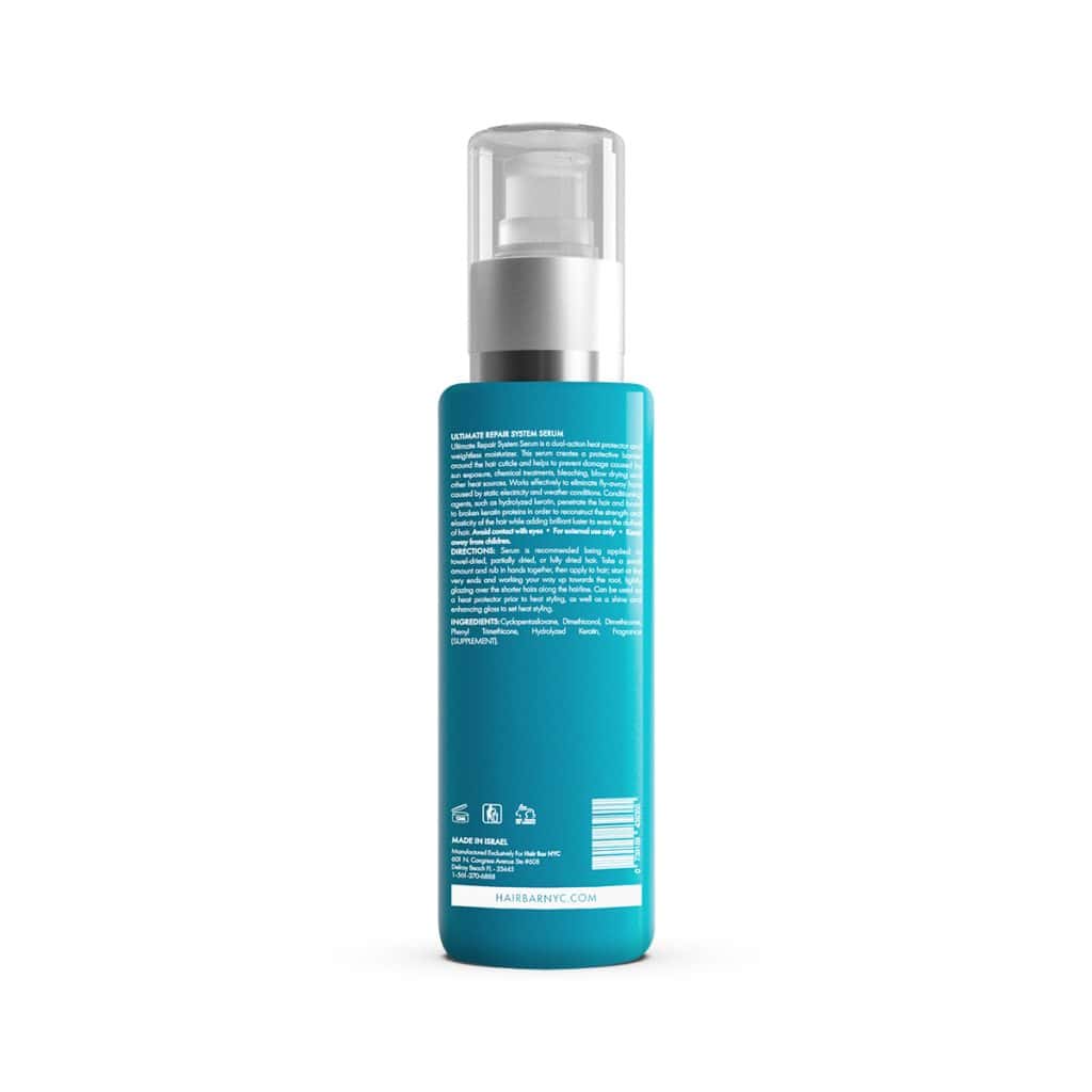 A blue bottle of Ultimate Repair System Conditioner with a pump dispenser, viewed from the back and showing product information and ingredients in white text.