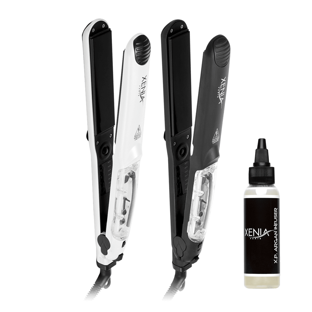 Two XP Ceramic Steamer Flat Irons with Argan Oil Infuser 1.25", in white and black, are displayed beside a small "Xenia XP Argan Infuser" bottle.