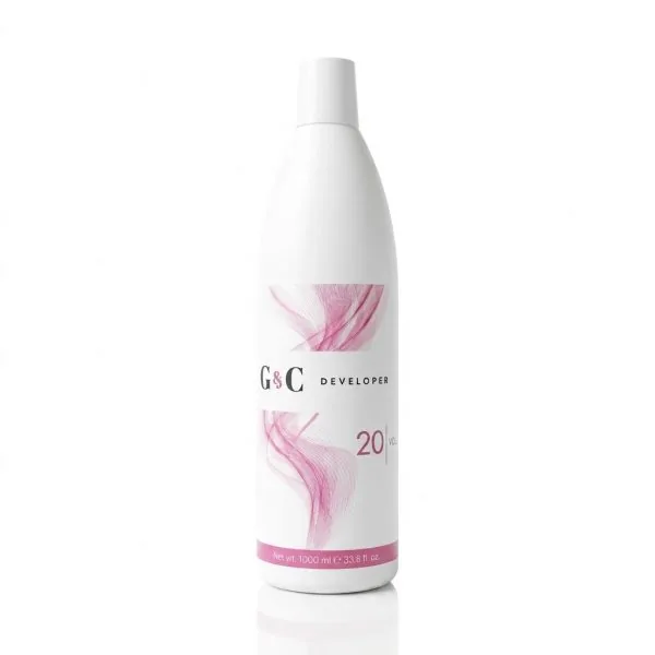 A 1000 ml (33.8 fl oz) white bottle of G&C Cream Developer 20 Volume, featuring a pink abstract design, is shown on a white background.