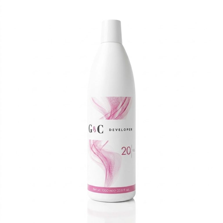 A 1000 ml (33.8 fl oz) white bottle of G&C Cream Developer 20 Volume, featuring a pink abstract design, is shown on a white background.