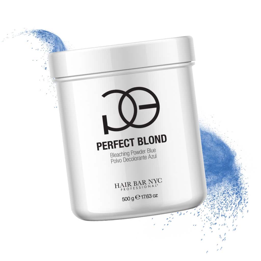 A white container labeled "Perfect Blond Bleaching Powder Blue" sits in front of a blue powder splash on a white background.