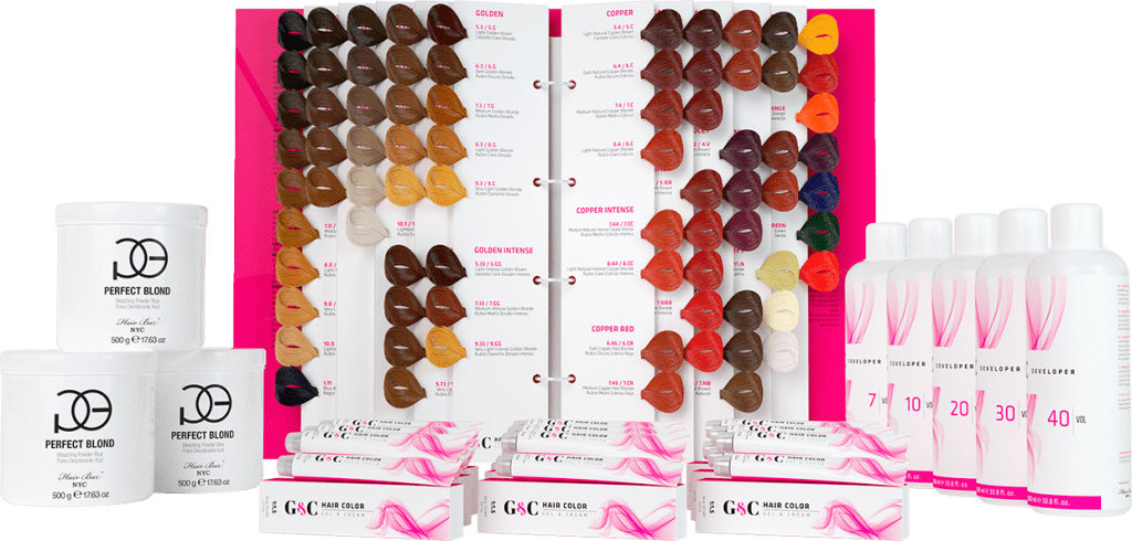 A display of hair color samples, hair color tubes, developer bottles, and tubs of hair products arranged neatly, showcasing a professional hair coloring kit.