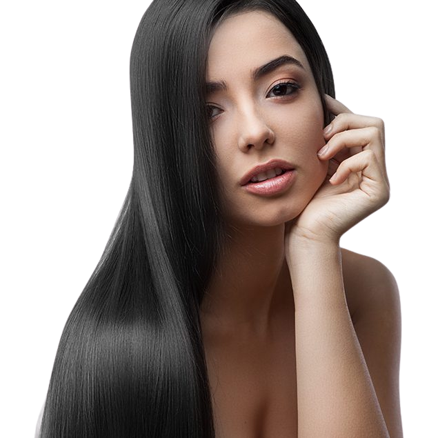 A woman with long, straight, black hair poses with her hand touching her face, looking toward the camera against a plain background.