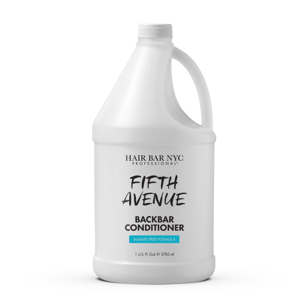 A large white gallon bottle labeled "Backbar Shampoo Gallon" from Hair Bar NYC Professional, sulfate-free formula, 1 US gallon (3785 ml).