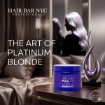 A jar of Blond Plex Platinum System Mask rests on a table in a modern room, while the blurred figure of a platinum blonde woman appears in the background.